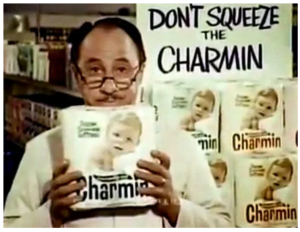 picture of Mr. Whipple with a pack of charmin toilet paper and a sign that says 